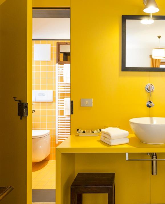 The washbasin in the Pine double room and the separated bathroom with toilet
